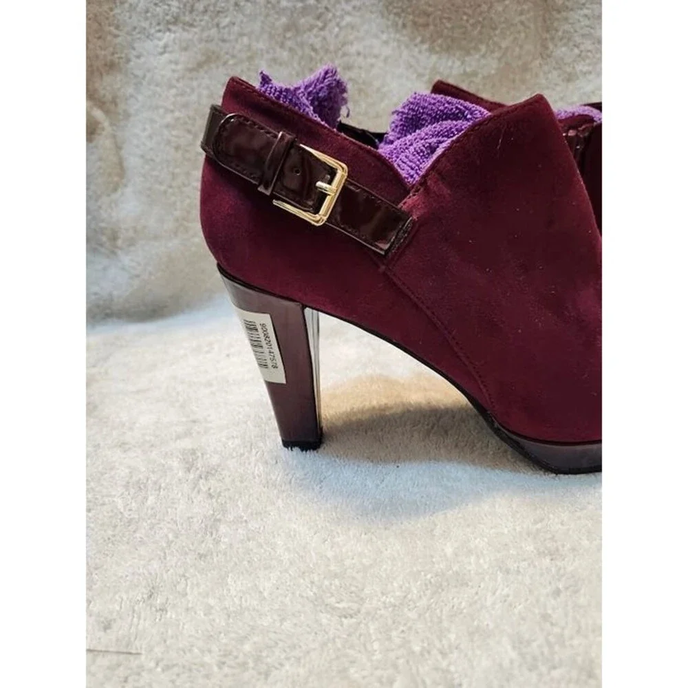 Women’s East 5th faux suede ankle booties in a rich maroon color with glossy pat